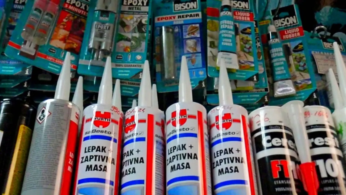 Packages of adhesives, sealants and epoxy products in a shop